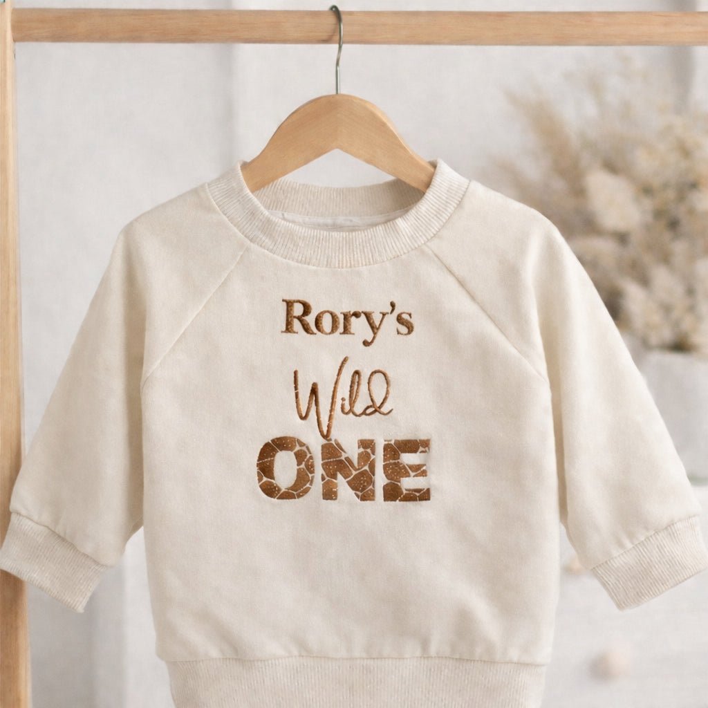 Personalised First Birthday Sweatshirt – Embroidered “Wild One” Baby Jumper - Pear Tree Stitch Studio