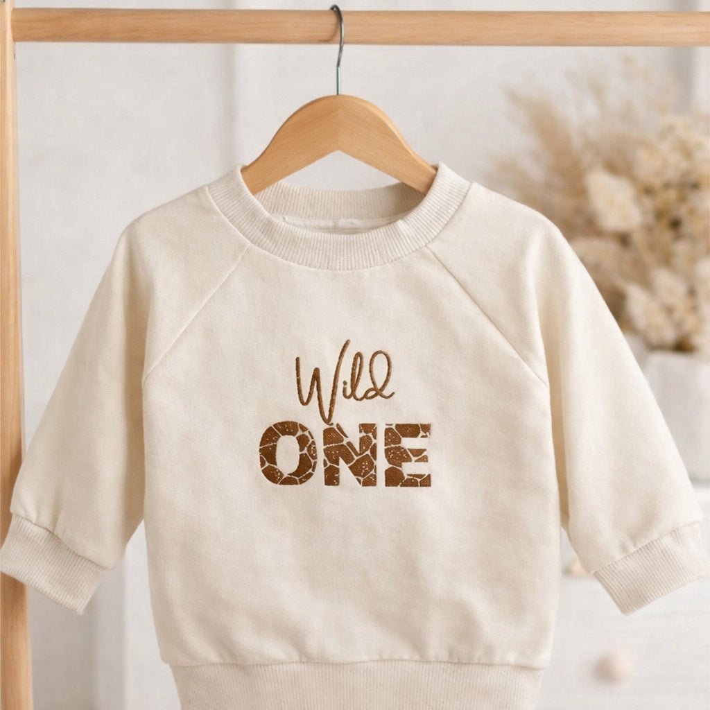 Personalised First Birthday Sweatshirt – Embroidered “Wild One” Baby Jumper - Pear Tree Stitch Studio