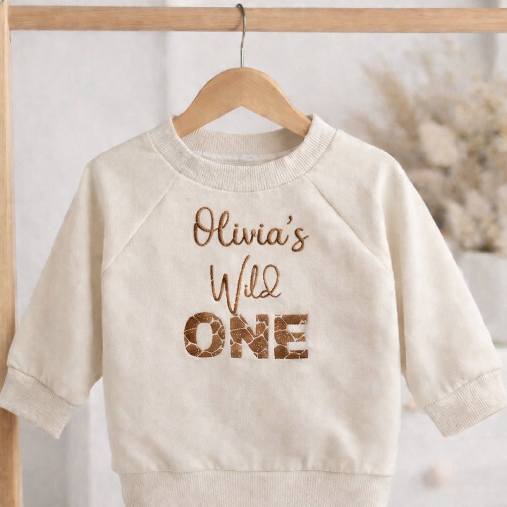 Personalised First Birthday Sweatshirt – Embroidered “Wild One” Baby Jumper - Pear Tree Stitch Studio